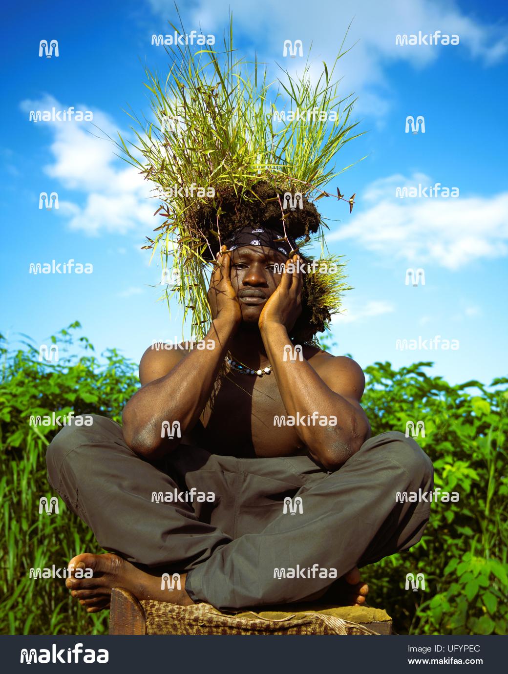 Elegance of an African woman with her hat highlighted 