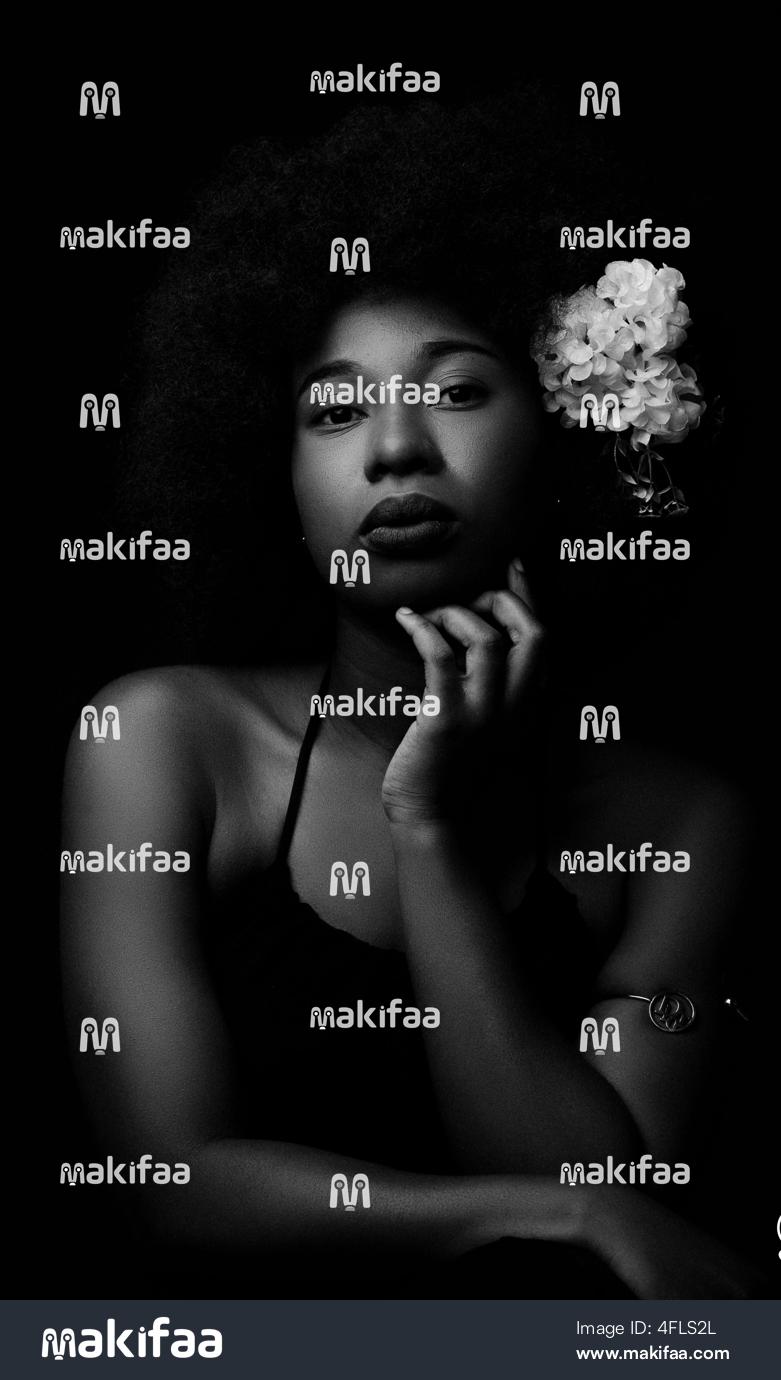 Beauty of an African woman highlighted in a black and white background