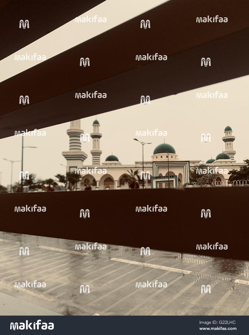 View of a mosque through the opening of a building 