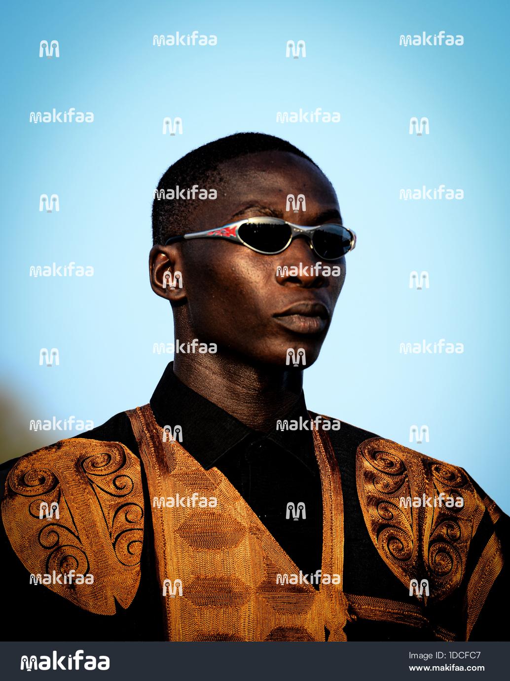 Stylish portrait of a young man in a traditional boubou 