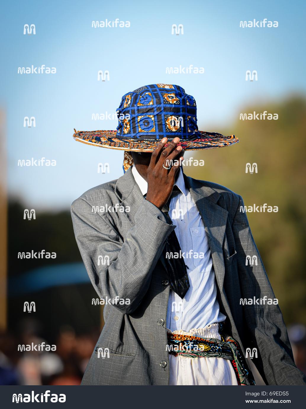 Stylish portrait of a young man dressed in Claas and fashion 
