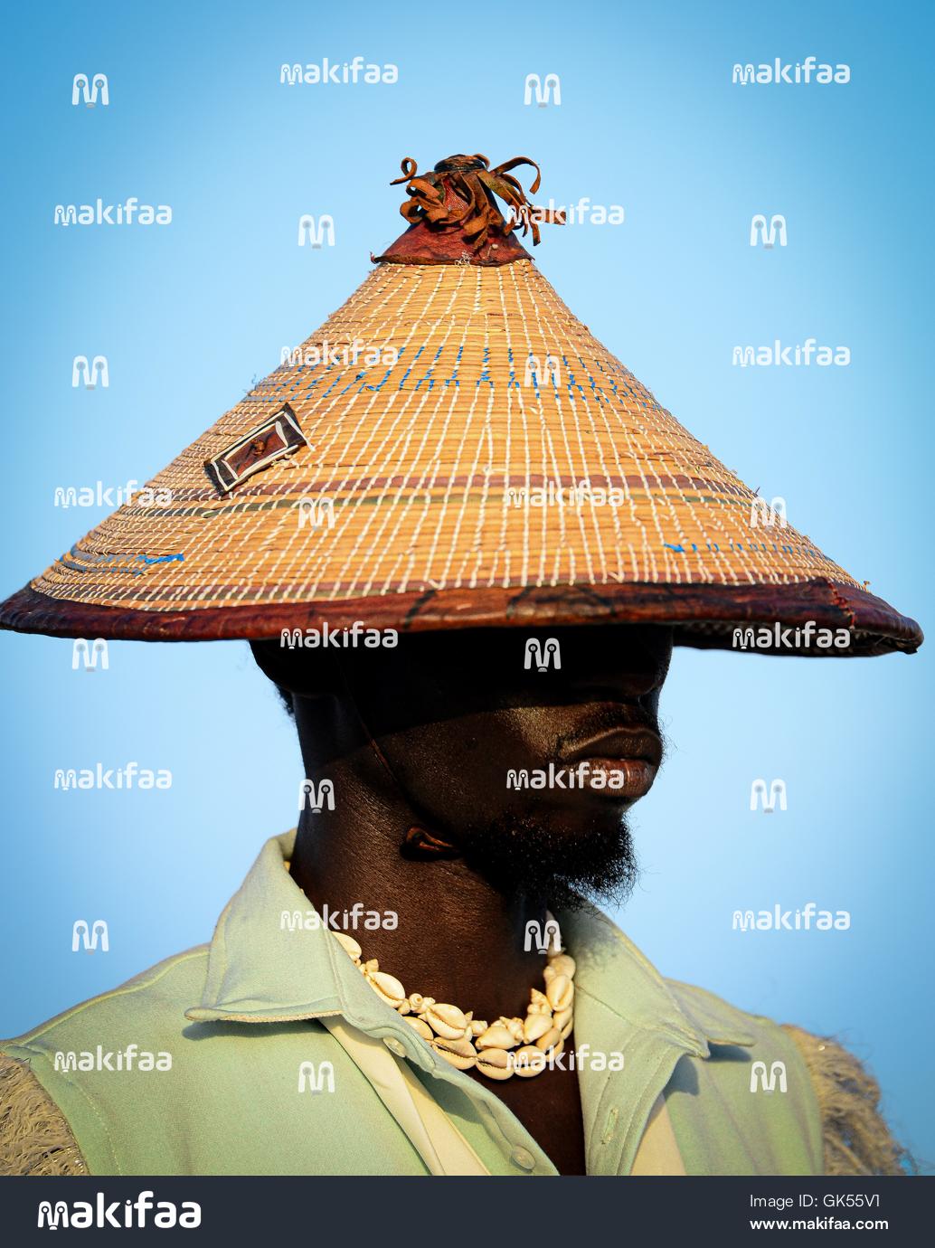 Stylish portrait of a young man wearing a hat 