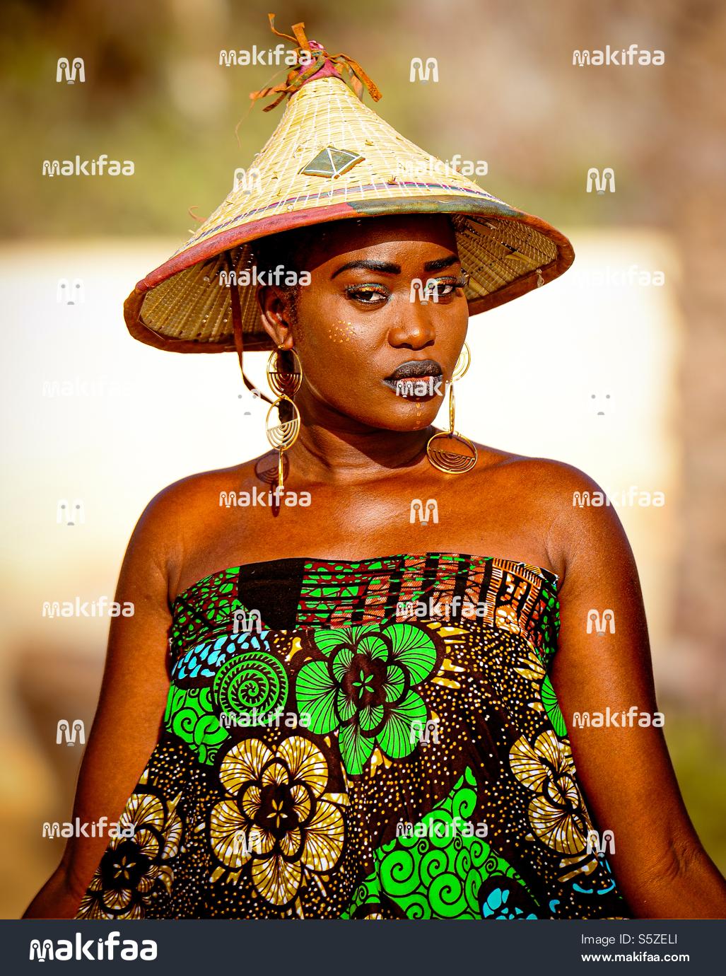 Portrait of an African woman wearing a hat 