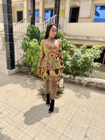 An African girl in a lovely Ankara dress.