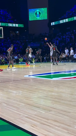 An intense basketball steal moment and then two-point shot