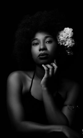 Beauty of an African woman highlighted in a black and white background