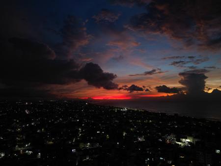 A brilliant sunset over a city  