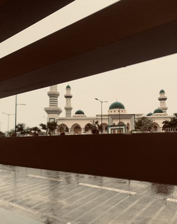 View of a mosque through the opening of a building 