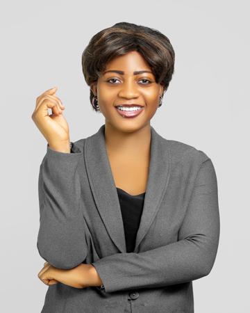 Portrait of a young woman in an office with a smile 