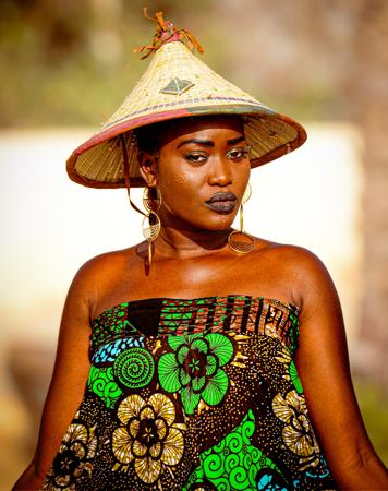 Portrait of an African woman wearing a hat 
