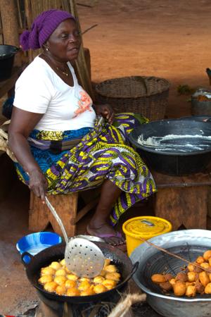 Donut seller by the roadside in Bohicon